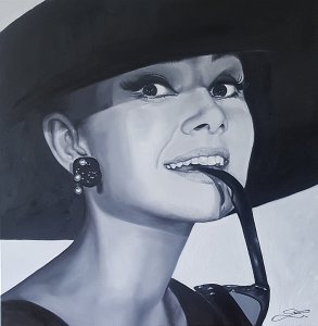 Audrey Hepburn s kloboukem