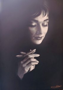 Audrey Hepburn s přejícíma rukama