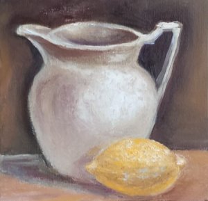 Milk jug with lemon