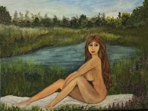 Nő a vízparton